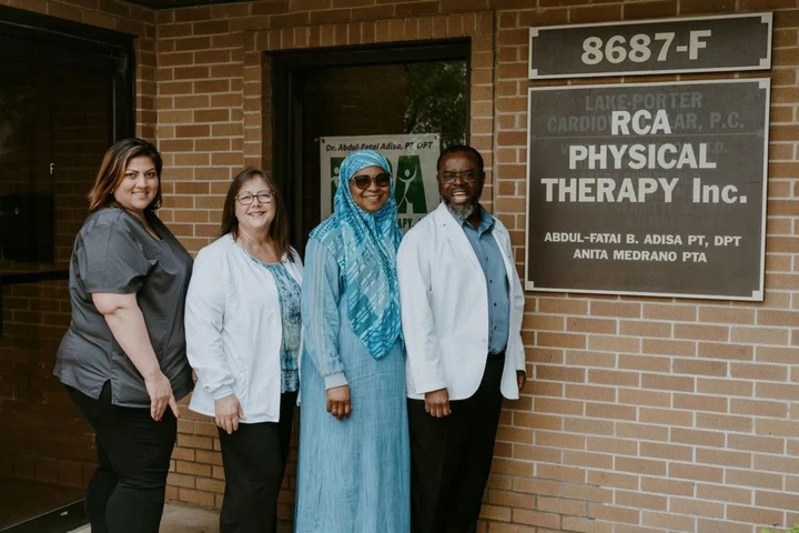 Dr. Abdul-Fatai Adisa and the RCA Physical Therapy team outside the Merrillville clinic